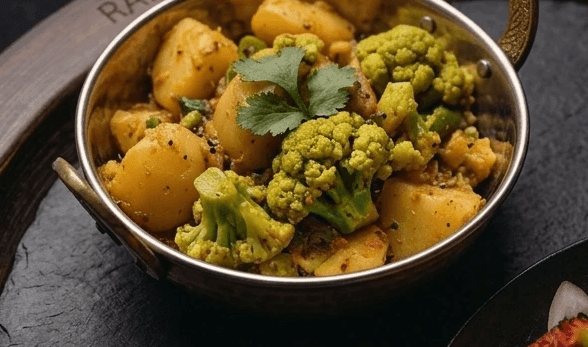 Concept: aloo gobi, dark studio lighting